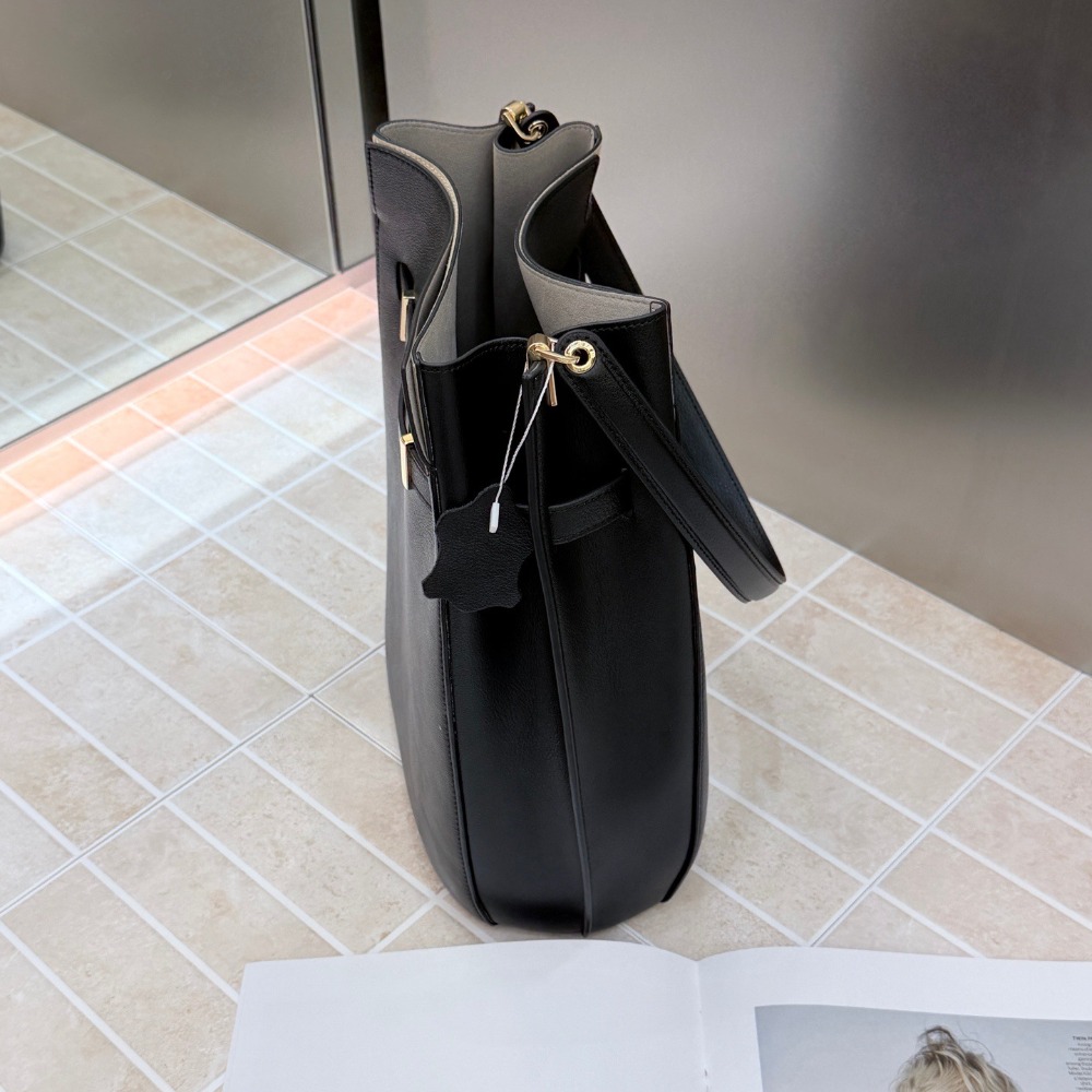New Bucket Bag Old Money Wind  - огляд і ціна Luxury Bags Leather
